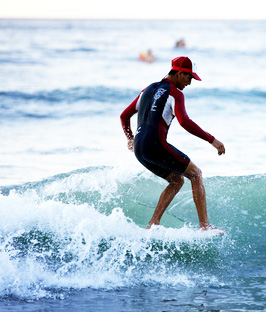 Surfer with red surfer lid