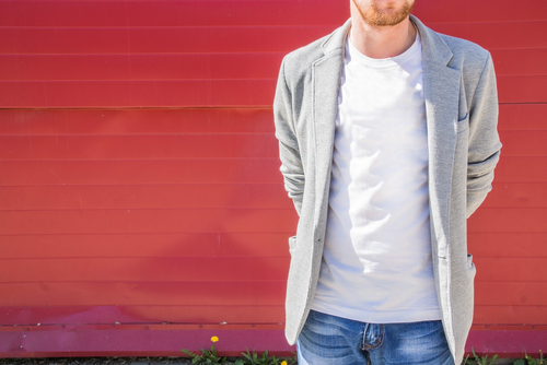 white T-shirt and grey fleece jacket