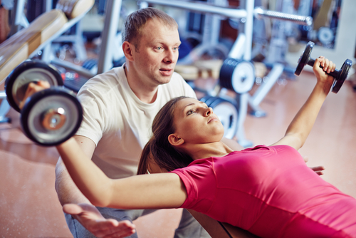 couple wearing moisture wicking t-shirt while working out