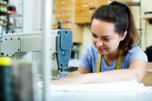 woman sewing professional machine