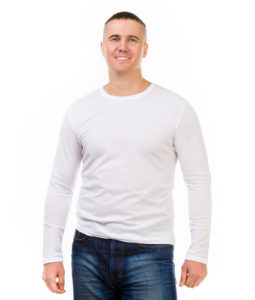 young attractive man in a white shirt with long sleeves