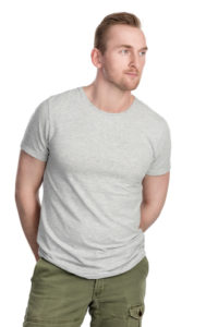 man wearing gray shirt green pants