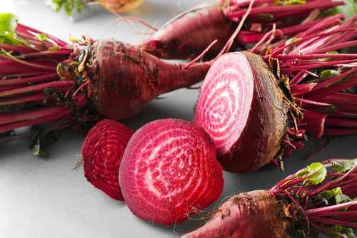 fresh sliced beets on table