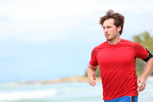 Man jogging on beach