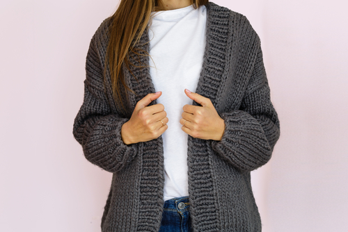 woman in fashionable gray knitted cardigan