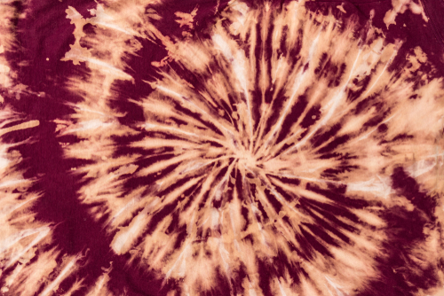 red tie dye in spiral pattern