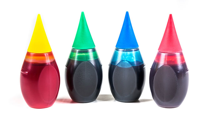 bottles of food coloring isolated