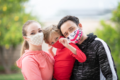 family wearing masks